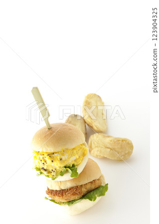 Egg and croquette mini hamburger and fries photographed on white background 123904325