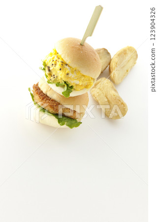 Egg and croquette mini hamburger and fries photographed on white background 123904326