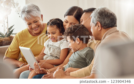 Family, home and people with tablet streaming a movie, subscription video or show online. Happy, love and smile big family bonding, fun and enjoy relax, social media and online video in house 123904346