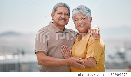 Couple, happy and outdoor portrait of senior love on retirement vacation in a city bonding and hugging with smile and care. Happiness, support and elderly man and woman being romantic in Puerto Rico 123904371
