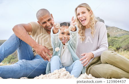 Children, family and beach with girl, mother and father playing in the sand while bonding on holiday or vacation. Travel, kids and summer with a woman, man and daughter bonding together at the coast Children, family and beach with girl, mother and father playing in the sand while bonding on holiday or vacation. Travel, kids and summer with a woman, man and daughter bonding together at the coast 123904437