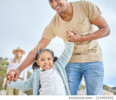 Happiness, dad and girl holding hands at the beach having fun, playing and walking together. Summer, love and portrait of happy father and child on family vacation, weekend and holiday by the ocean 123904493