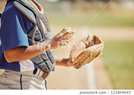 Baseball pitcher, sports and man athlete with ball and glove ready to throw at game or training. Fitness, exercise and professional male softball player practicing to pitch for match on outdoor field Baseball pitcher, sports and man athlete with ball and glove ready to throw at game or training. Fitness, exercise and professional male softball player practicing to pitch for match on outdoor field 123904645