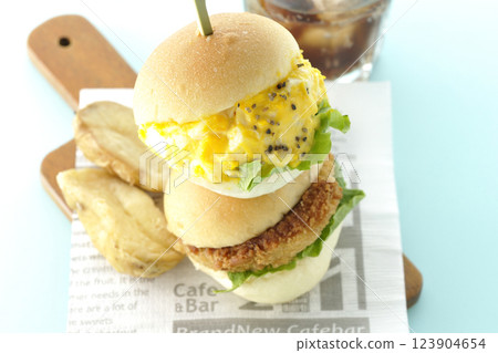 Egg and croquette mini hamburger with fries and cola Egg and croquette mini hamburger with fries and cola 123904654