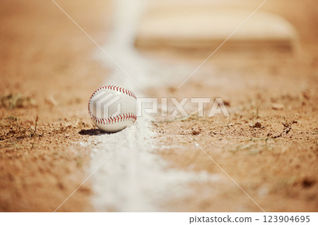 Baseball, chalk line and ball on field before sports game, training and practice. Competition, motivation and sport equipment on baseball field ground. Isolated, close up and copy space for softball 123904695