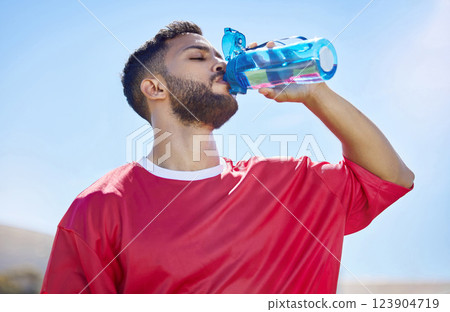 Sports, fitness and drinking water with man in sunshine and blue sky mock up for outdoor wellness, training and healthy lifestyle. Tired athlete with water bottle for workout, exercise or practice Sports, fitness and drinking water with man in sunshine and blue sky mock up for outdoor wellness, training and healthy lifestyle. Tired athlete with water bottle for workout, exercise or practice 123904719