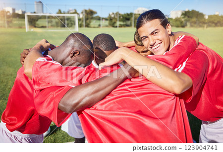 Soccer, fitness and team in a huddle for motivation, goals and group mission on a soccer field for a sports game. Smile, team building and football players planning a strategy, targets and vision 123904741