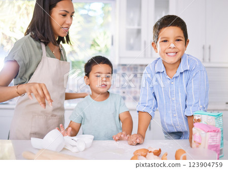 Cooking, help and mother with children in kitchen for learning, breakfast or creative child development. Baking, family and happy with mom and kids with flour on nose for cake, chef and food together 123904759