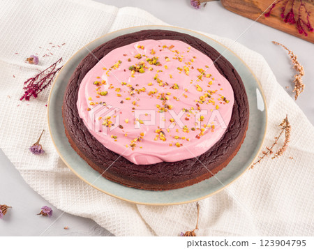 Beetroot chocolate cake with pink cream cheese pistachio icing Beetroot chocolate cake with pink cream cheese pistachio icing 123904795