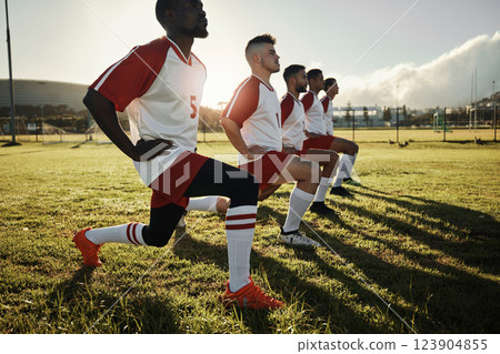 Fitness soccer, men and stretching with sport team on sports field training, exercise or workout. Athlete, group or teamwork in diversity, teamwork and collaboration on warm up for football game Fitness soccer, men and stretching with sport team on sports field training, exercise or workout. Athlete, group or teamwork in diversity, teamwork and collaboration on warm up for football game 123904855