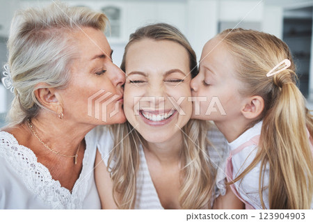 Kiss, child and grandmother with love for mother on mothers day in the living room of their house. Girl and senior woman kissing mom with affection, care and smile to show gratitude in their home 123904903