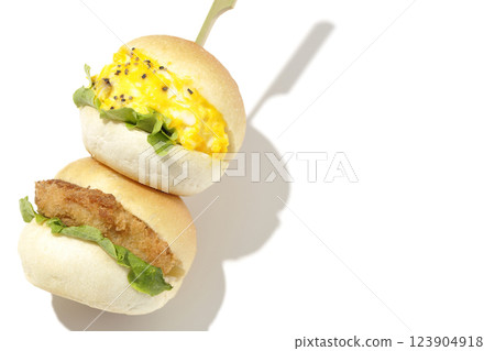 Egg and croquette mini hamburger photographed on white background Egg and croquette mini hamburger photographed on white background 123904918