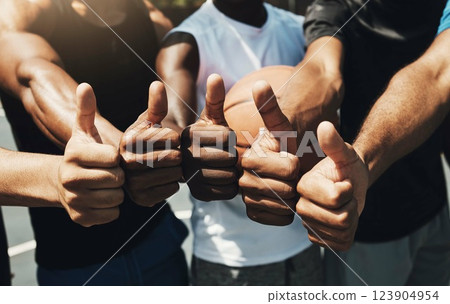 Basketball men, hands and thumbs up in group outdoor for sports with friends, together or team. Diversity, circle and huddle for teamwork, motivation and fitness on basketball court, training or game 123904954