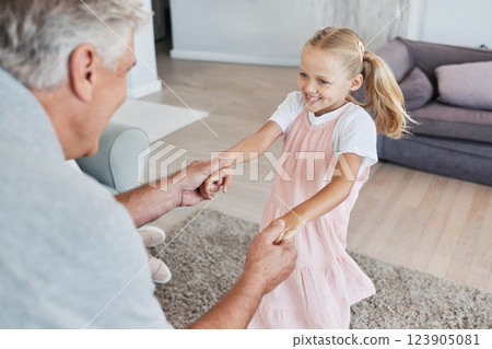 Family love, grandfather and child, playing at family home and bonding together in living room. Senior man, young girl have fun and playful, swing and hand holding, happy in retirement and holiday. Family love, grandfather and child, playing at family home and bonding together in living room. Senior man, young girl have fun and playful, swing and hand holding, happy in retirement and holiday. 123905081