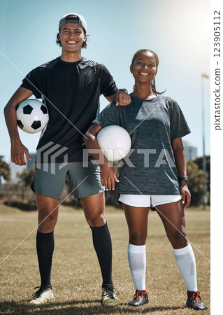 Friends, soccer and fitness, soccer field and soccer player together for workout and sport training outdoor portrait. Black woman, Mexican man and soccer ball, sports motivation and team in game. 123905112