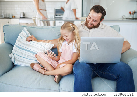 Father, bonding and girl with phone on relax sofa in house or home living room for internet game, web search or social media. Smile, happy and fun child with man on laptop technology for remote work 123905181