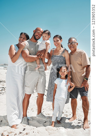 Big family, portrait and smile on beach holiday, vacation or Mexico summer trip. Generations, parents and children on sandy, sea or ocean shore having fun, bonding and spending quality time together. Big family, portrait and smile on beach holiday, vacation or Mexico summer trip. Generations, parents and children on sandy, sea or ocean shore having fun, bonding and spending quality time together. 123905352