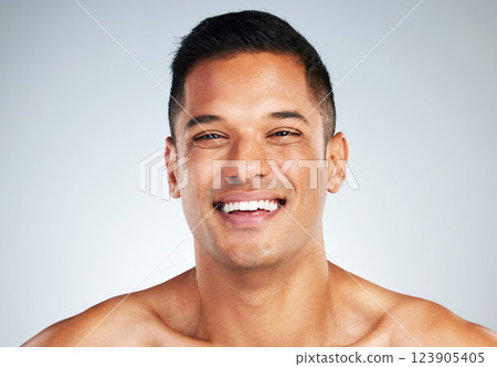 Man face, skin and teeth, natural beauty and skincare, happy model in cosmetology advertising. Clean and fresh, glow and facial treatment, body wellness or dental mouth hygiene in studio background. 123905405