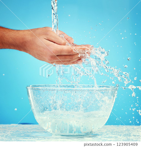Water bowl, health and hands splash liquid for hygiene, cleaning and wellness beauty routine with mockup. Water splash container, skincare and wet palm of self care man isolated on blue background 123905409