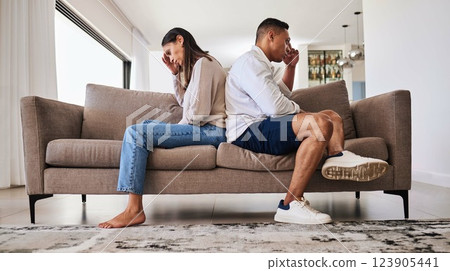 Fight, frustrated and couple with a problem in their marriage on the living room sofa of their house. Sad, angry and depressed man and woman thinking of divorce, conflict and mistake on the couch Fight, frustrated and couple with a problem in their marriage on the living room sofa of their house. Sad, angry and depressed man and woman thinking of divorce, conflict and mistake on the couch 123905441