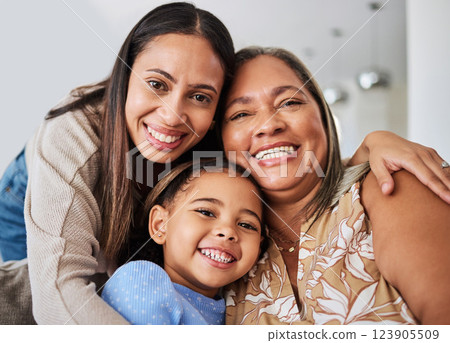 Love, family and portrait of multigenerational women on a sofa, relax, happy and bonding in a living room. Portrait, mother, girl and grandma smile, hug and relaxing on a couch enjoying quality time 123905509