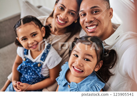 Smile, selfie and portrait of a happy family that love enjoy quality time, relaxing and bonding together in a house. Mother, father and girl children siblings smiling for pictures at home in Lisbon 123905541
