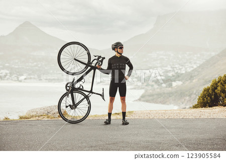 Fitness, sports and cycling man with his bike on a mountain road for health, wellness and morning cardio exercise. Athlete male with outdoor for energy, workout and marathon training with a bicycle Fitness, sports and cycling man with his bike on a mountain road for health, wellness and morning cardio exercise. Athlete male with outdoor for energy, workout and marathon training with a bicycle 123905584