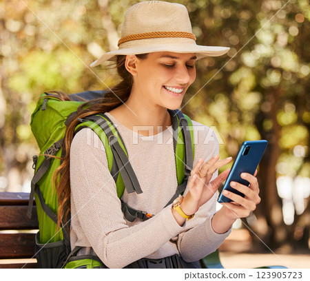 Hiking, phone and woman checking gps or online map in a forest, happy, relax and navigation. Nature, adventure and smiling woman exploring the woods, sitting to text and read message on smartphone Hiking, phone and woman checking gps or online map in a forest, happy, relax and navigation. Nature, adventure and smiling woman exploring the woods, sitting to text and read message on smartphone 123905723