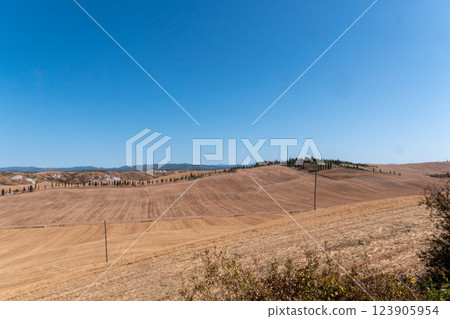 A photo of the San Quirico hills captures the essence of the stunning Tuscan landscape 123905954