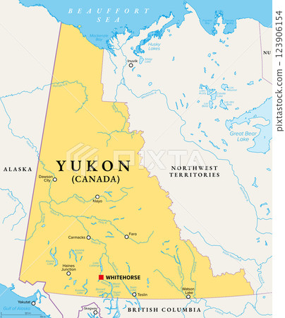 Yukon, westernmost territory of Canada, political map, with capital Whitehorse and seven more municipalities. Yukon borders the Beaufort Sea, Alaska, British Columbia and the Northwest Territories. 123906154