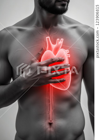 Heart glowing brightly within the chest of a man, symbolizing life and vitality in an artistic representation 123906815