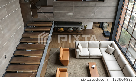 Elegant modern living room with wooden staircase and large windows in urban apartment Elegant modern living room with wooden staircase and large windows in urban apartment 123906885