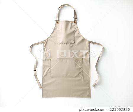 Kitchen apron ready for use featuring two spacious pockets and adjustable straps suitable for cooking and baking activities 123907280