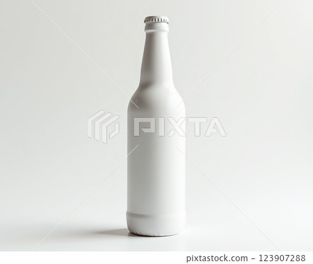 Empty white bottle stands against a neutral background highlighting its simple design and smooth finish 123907288
