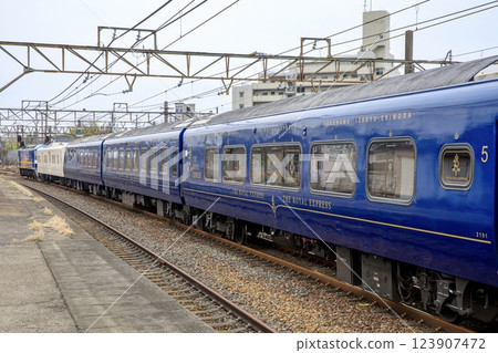 Royal Express Class A transport train arriving at Obu Station 123907472