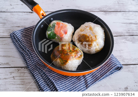 Pan-fried rice balls wrapped in rice paper 123907634