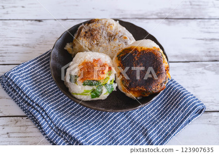 Pan-fried rice balls wrapped in rice paper Pan-fried rice balls wrapped in rice paper 123907635