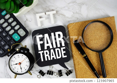 FT - Fair Trade acronym with calculator, alarm clock and magnifying glass, Business concept background FT - Fair Trade acronym with calculator, alarm clock and magnifying glass, Business concept background 123907965