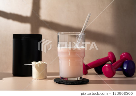 Strawberry pink protein shake. Food supplement, fitness sport, health and nutrition. Strawberry pink protein shake. Food supplement, fitness sport, health and nutrition. 123908500