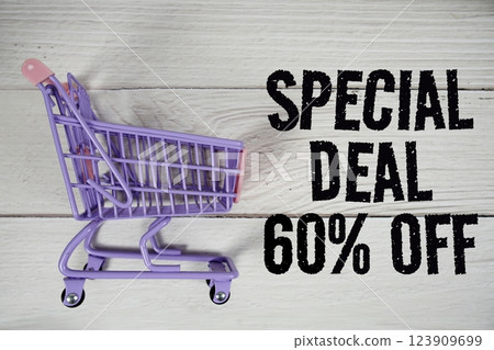 Special Deal 60% off and trolley shopping cart on wooden background Special Deal 60% off and trolley shopping cart on wooden background 123909699