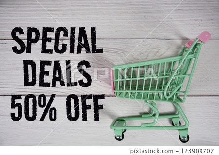 Special Deal 50% off and trolley shopping cart on wooden background 123909707