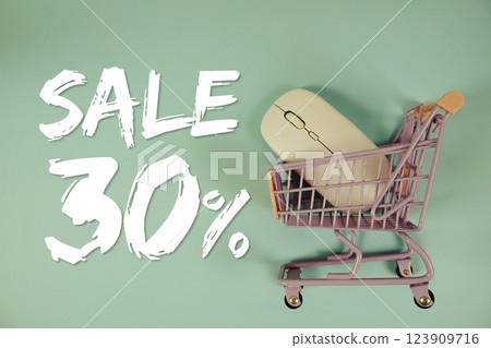 Sale 30% Special Discount shopping online with trolley shopping cart and optical mouse on blue background 123909716