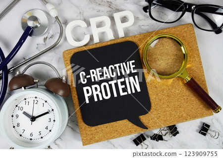 CRP C-Reactive Protein acronym with stethoscope, alarm clock and magnifying glass, medical and healthcare concept background CRP C-Reactive Protein acronym with stethoscope, alarm clock and magnifying glass, medical and healthcare concept background 123909755