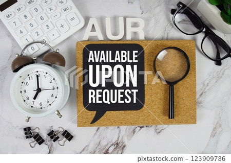 AUR Available Upon Request acronym with calculator, alarm clock and magnifying glass, Business concept background 123909786