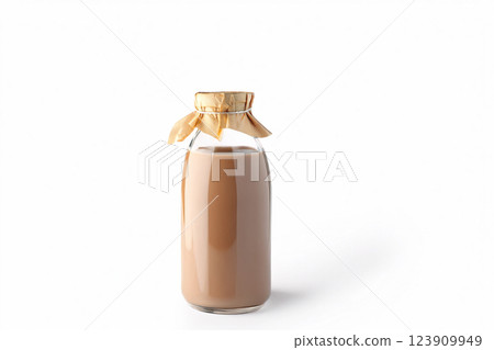 A glass bottle of coffee milk on a white background A glass bottle of coffee milk on a white background 123909949