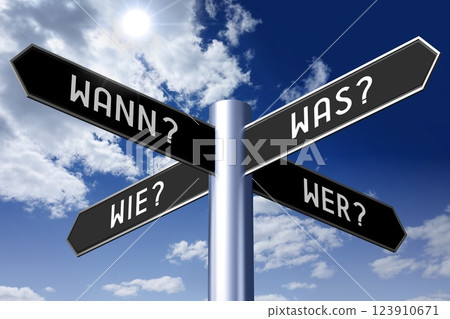 Wann, was, wie, wer - questions in German - signpost with four arrows Wann, was, wie, wer - questions in German - signpost with four arrows 123910671