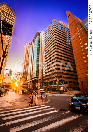 The sun sets over the skyscrapers of Umeda, Osaka 123910705