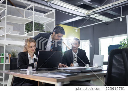 Business people professional teamwork talking brainstorming plan project in office. Success person cooperation meeting planning on table office. 123910761
