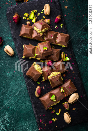 Dubai chocolate with kadayif pistachio filling Dubai chocolate with kadayif pistachio filling 123910883