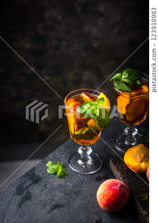 Cold ice tea with peach and mint Cold ice tea with peach and mint 123910983